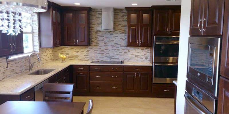 brown kitchen cabinets in a modern luxury kitchen